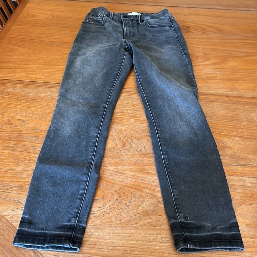 Good American faded distressed black skinny jeans